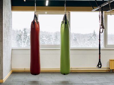Minimalist fitness equipment on dark floor